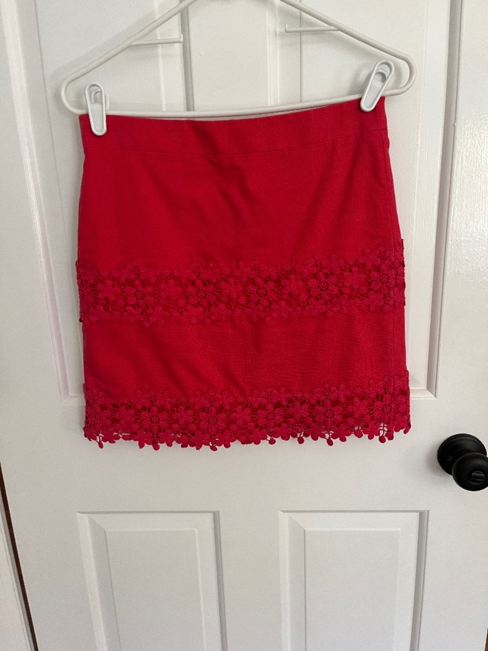 Red appliqué mini skirt